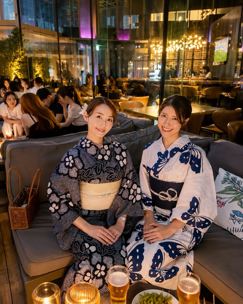 Women enjoying a beer garden in yukata